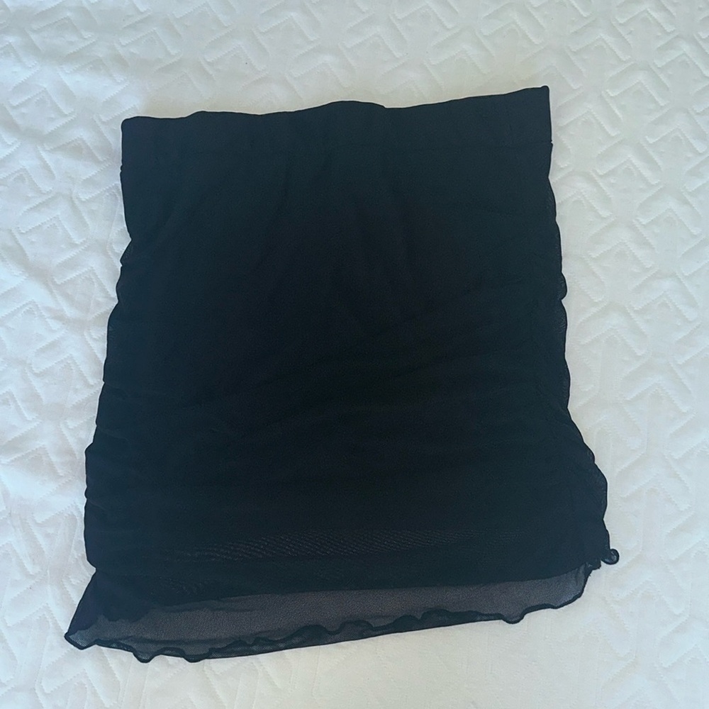 Black mini skirt with sheer ruffles